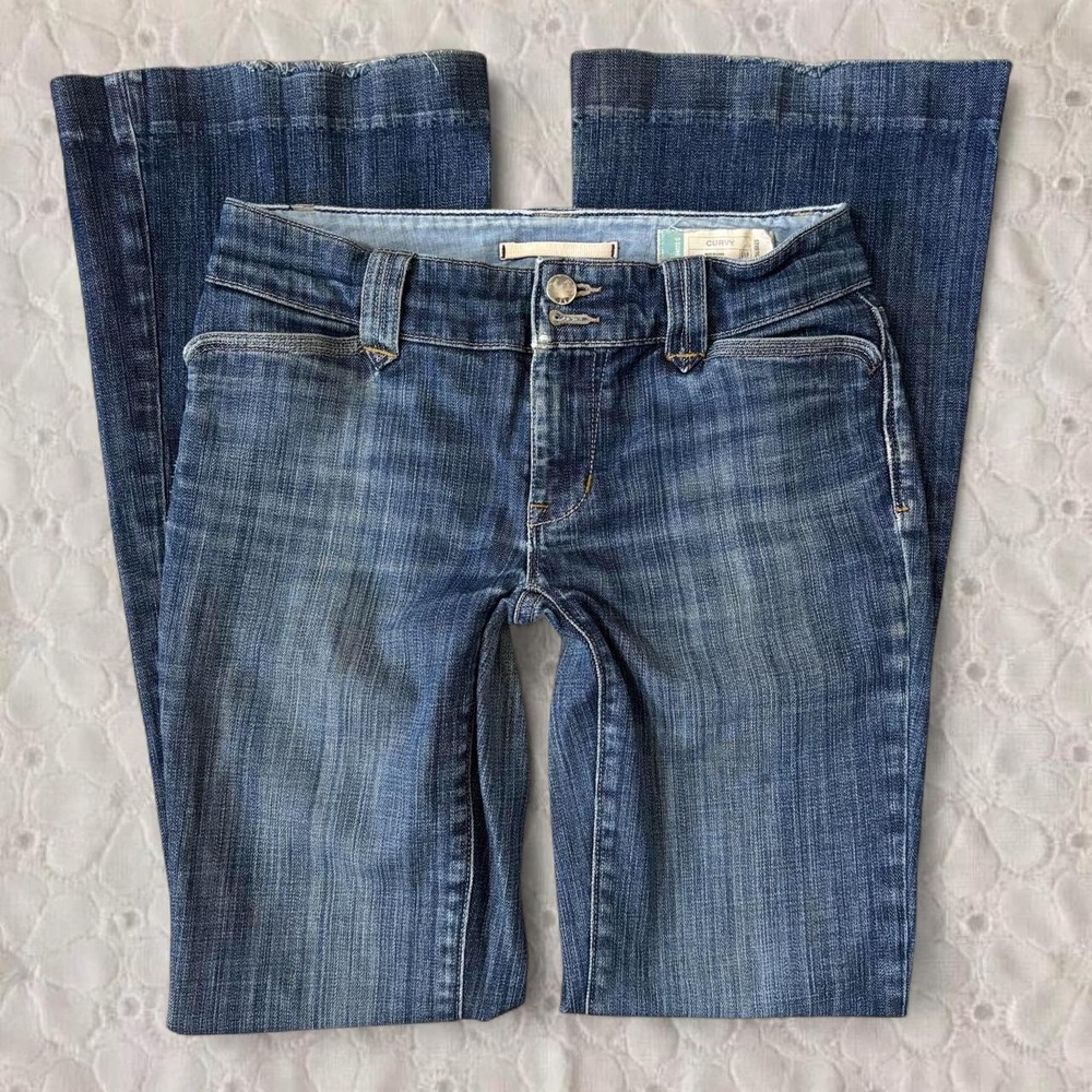 Low rise old size 0 flare jeans in a nice distressed wash